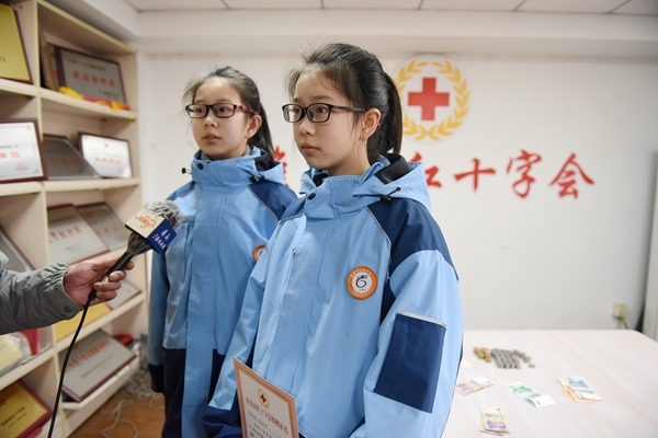淮南双胞胎小姐妹为叙利亚地震灾区捐款9